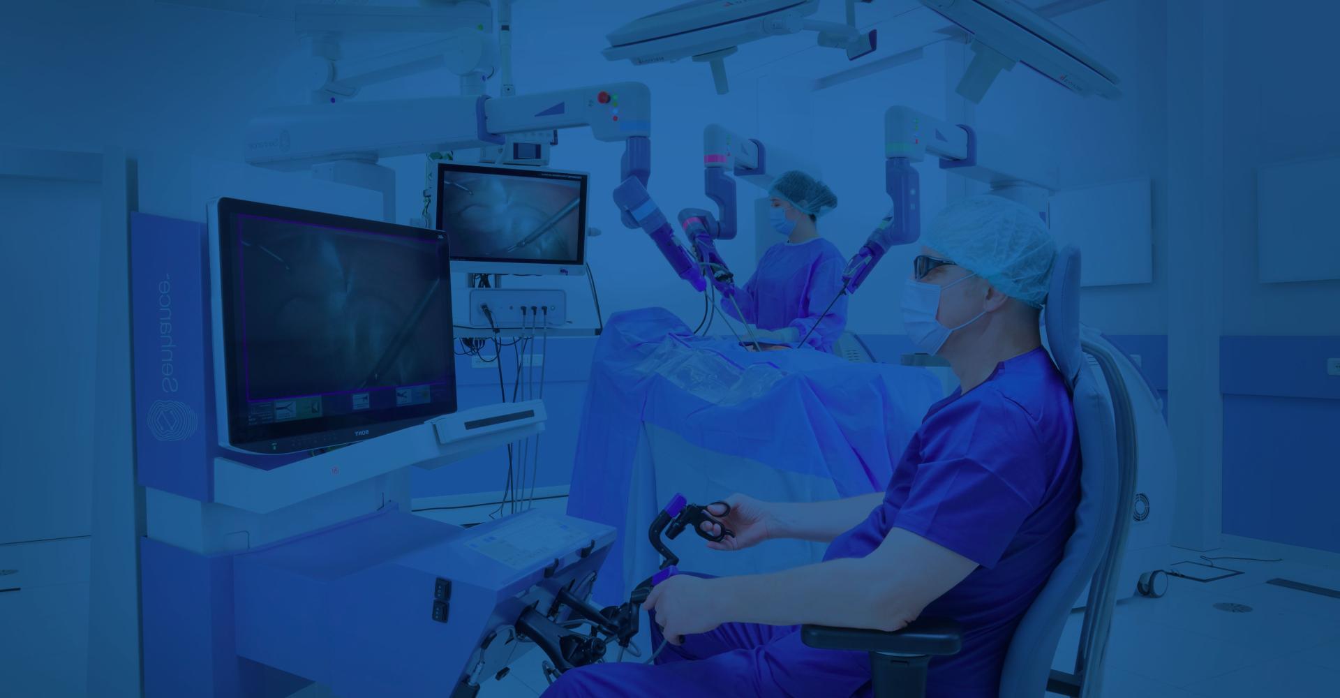 A surgeon controlling a Senhance System in a blue room