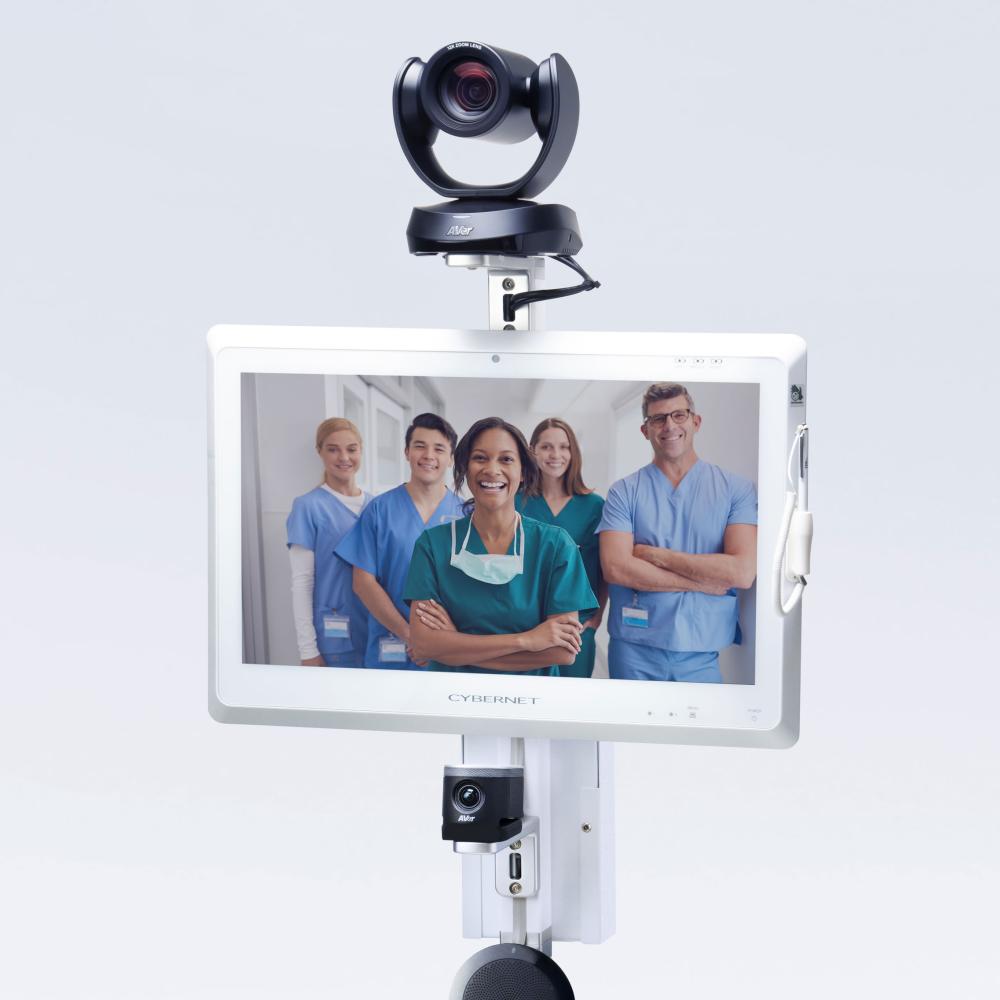 A group of doctors on a monitor